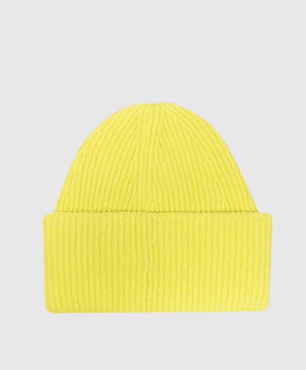 Solotre A green wool hat with a scar