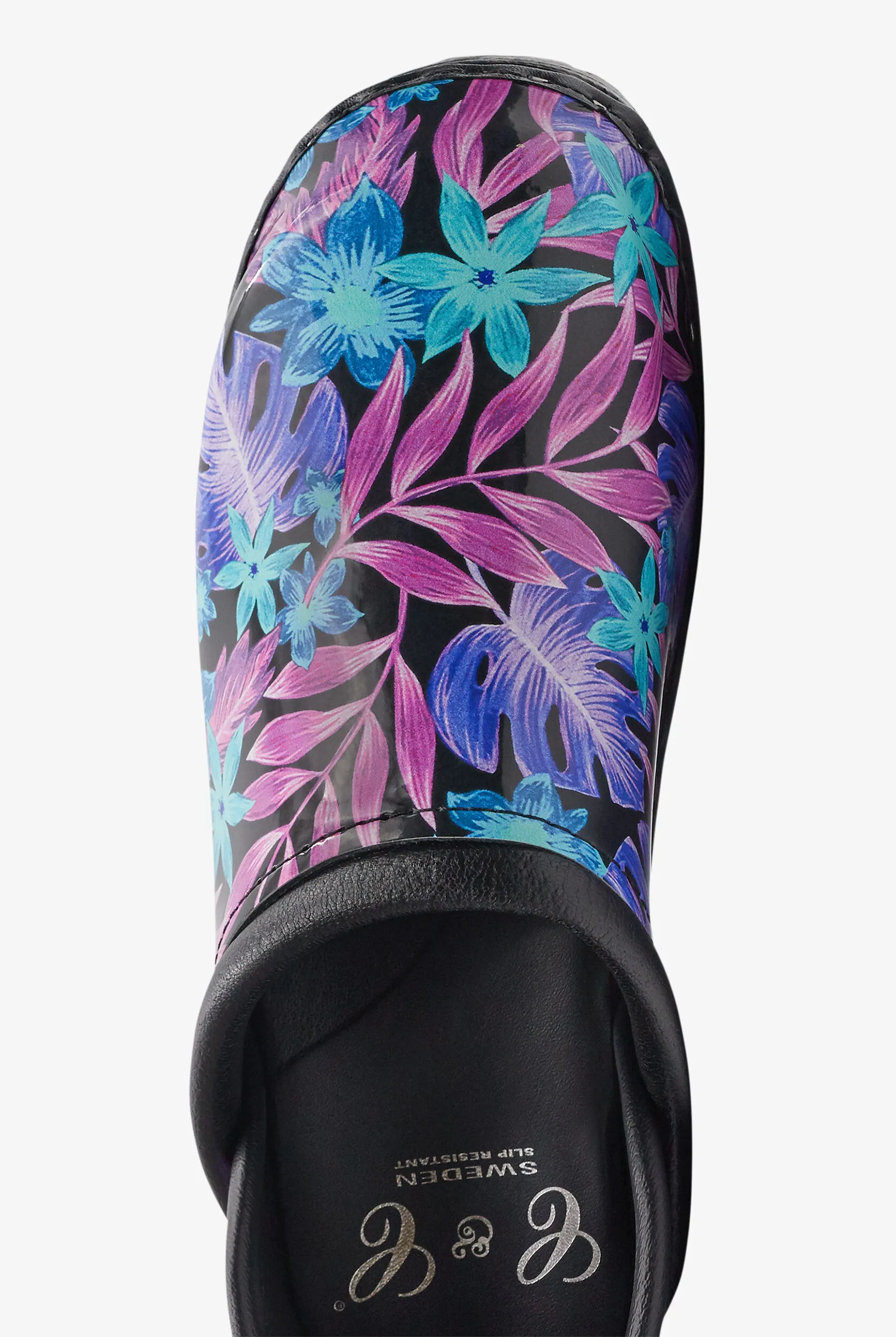 Zuecos de enfermería C and C Sweden Floral Luau Black con talón cerrado para mujer Exclusivo de UA